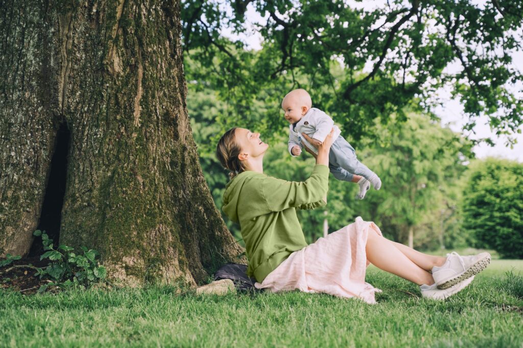 Mother and baby. Concept of natural maternity and motherhood.